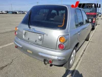 Nissan MARCH лот № 1002 оценка 3.5  с аукциона в Японии 4