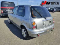 Nissan MARCH лот № 1002 оценка 3.5  с аукциона в Японии 1