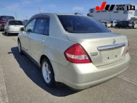 Nissan TIIDA LATIO лот № 1003 оценка 3.5  с аукциона в Японии 1