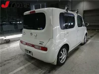 Nissan CUBE лот № 3028 оценка -  с аукциона в Японии 1