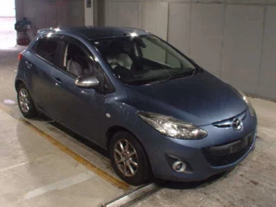 Mazda DEMIO  с аукциона в Японии