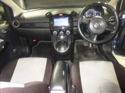 Mazda DEMIO  с аукциона в Японии