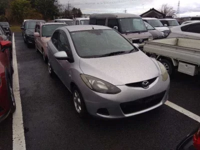 Mazda DEMIO  с аукциона в Японии