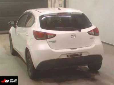 Mazda DEMIO  с аукциона в Японии