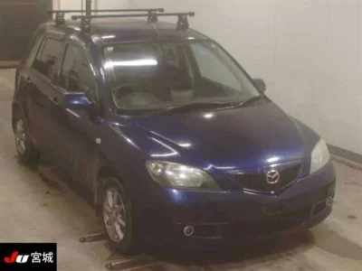 Mazda DEMIO  с аукциона в Японии