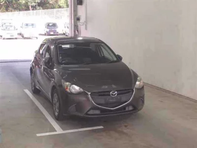 Mazda DEMIO  с аукциона в Японии