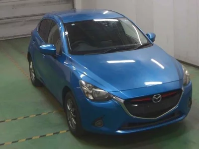 Mazda DEMIO  с аукциона в Японии