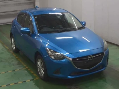 Mazda DEMIO  с аукциона в Японии