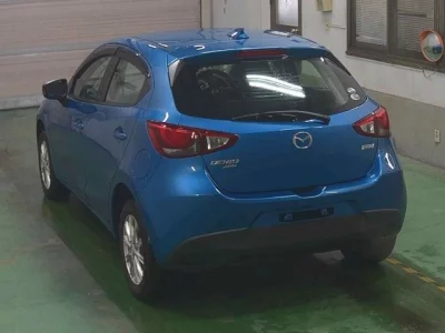 Mazda DEMIO  с аукциона в Японии