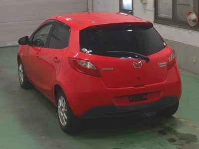 Mazda DEMIO  с аукциона в Японии