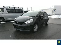 Honda FIT лот № 703 оценка 3.5  с аукциона в Японии 1