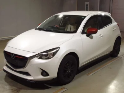 Mazda DEMIO  с аукциона в Японии