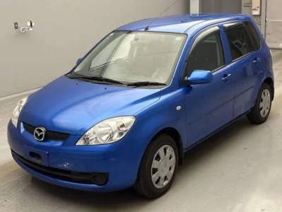 Mazda DEMIO  с аукциона в Японии