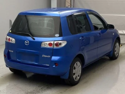 Mazda DEMIO  с аукциона в Японии