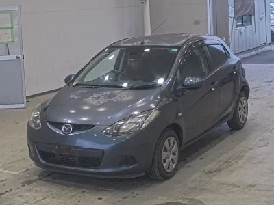 Mazda DEMIO  с аукциона в Японии