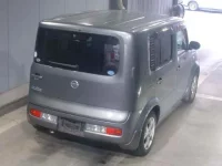 Nissan CUBE лот № 1023 оценка   с аукциона в Японии 1