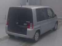 Honda MOBILIO лот № 4069 оценка RA  с аукциона в Японии 1