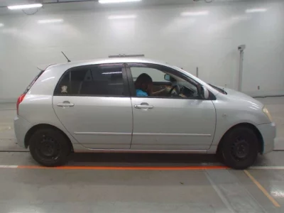 Toyota COROLLA RUNX  с аукциона в Японии