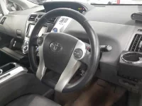 Toyota PRIUS ALPHA лот № 30080 оценка 3.5  с аукциона в Японии 6