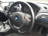 BMW 1-Series лот № 38023 оценка 4  с аукциона в Японии 6