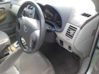 Toyota COROLLA AXIO лот № 30303 оценка R  с аукциона в Японии 6