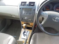 Toyota COROLLA AXIO лот № 30303 оценка R  с аукциона в Японии 8