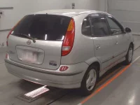 Nissan TINO лот № 10351 оценка 3  с аукциона в Японии 1