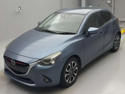 Mazda DEMIO  с аукциона в Японии