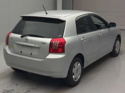 Toyota COROLLA RUNX  с аукциона в Японии