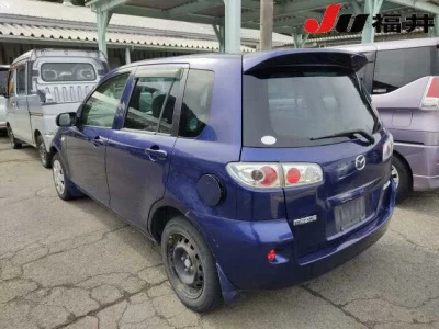 Mazda DEMIO  с аукциона в Японии