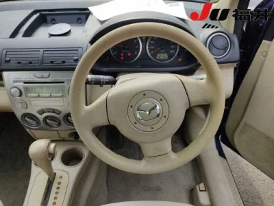 Mazda DEMIO  с аукциона в Японии