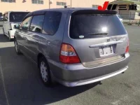 Honda ODYSSEY лот № 1104 оценка 3.5  с аукциона в Японии 1