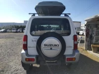 Suzuki JIMNY SIERRA лот № 4009 оценка 3.5  с аукциона в Японии 3