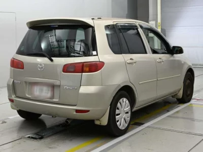 Mazda DEMIO  с аукциона в Японии