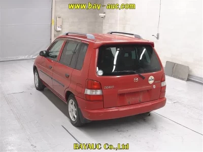 Mazda DEMIO  с аукциона в Японии