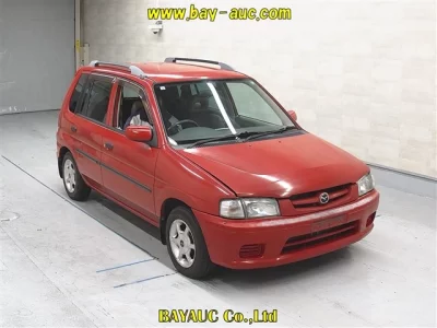 Mazda DEMIO  с аукциона в Японии