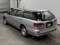 Nissan EXPERT лот № 11232 оценка 4  с аукциона в Японии 1