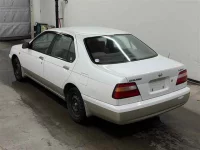 Nissan BLUEBIRD лот № 60059 оценка R  с аукциона в Японии 1