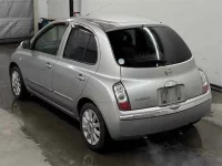 Nissan MARCH лот № 90202 оценка 4  с аукциона в Японии 1