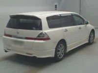 Honda ODYSSEY лот № 77109 оценка RA  с аукциона в Японии 1