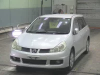 Nissan WINGROAD лот № 7095 оценка 3.5  с аукциона в Японии 2