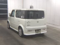 Nissan CUBE лот № 7140 оценка 3.5  с аукциона в Японии 1