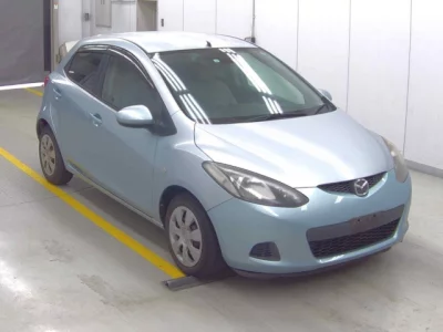 Mazda DEMIO  с аукциона в Японии