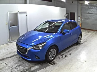 Mazda DEMIO  с аукциона в Японии