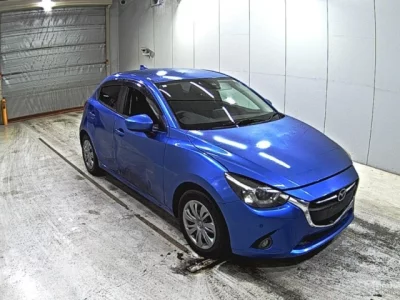 Mazda DEMIO  с аукциона в Японии