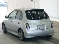 Nissan MARCH лот № 2427 оценка 3.5  с аукциона в Японии 1