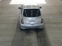 Nissan MARCH лот № 2427 оценка 3.5  с аукциона в Японии 2