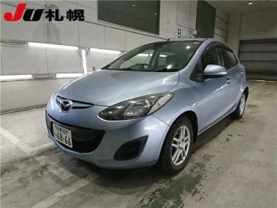 Mazda DEMIO  с аукциона в Японии
