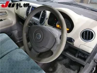 Nissan MOCO лот № 3063 оценка -  с аукциона в Японии 2