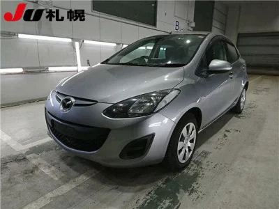 Mazda DEMIO  с аукциона в Японии